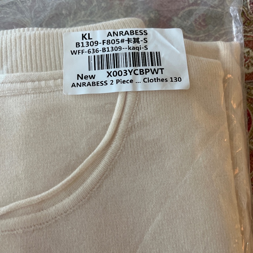 Two piece women’s lounge wear, top and knit bottom